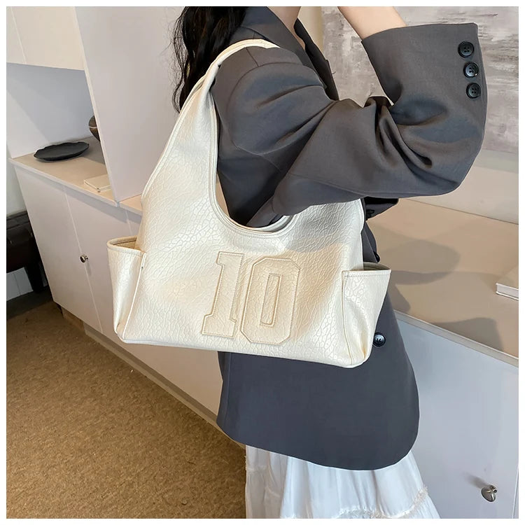 Luxury Women Bag 2025 New Armpit Handbags Women Shoulder Hobos Purse Top-Handle Bag Punk Cool Girls Shopping Packs Large Bolsas